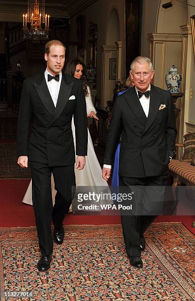 Prince William, Duke of Cambridge leaves Clarence House with his father Prince Charles, Prince of Wales to travel to Buckingham Palace for the...