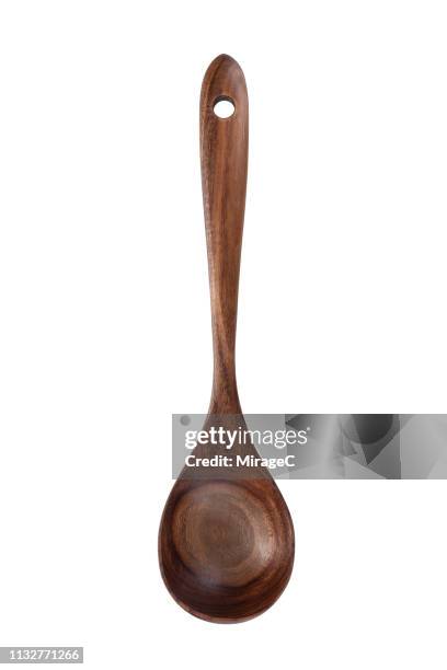 wooden kitchen ladle on white - utensile di portata foto e immagini stock