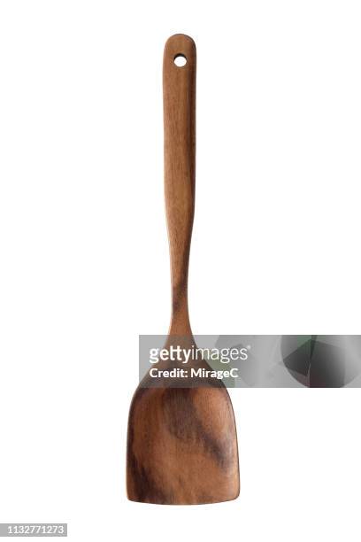 wooden kitchen spatula on white - spatula stock pictures, royalty-free photos & images