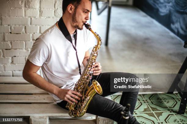 play that funky music - saxophone stock pictures, royalty-free photos & images