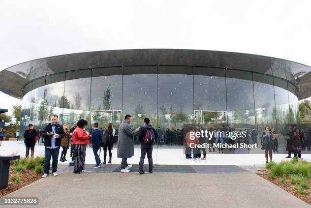 Attendees gather before an Apple product launch event at the Steve Jobs Theater at Apple Park on March 25, 2019 in Cupertino, California. Apple Inc....