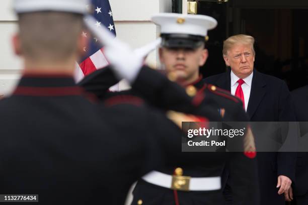 President Donald J. Trump walks out of the South Portico of the White House behind US Marines to greet Prime Minister of Israel Benjamin Netanyahu...