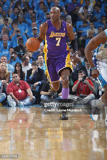 Lamar Odom of the Los Angeles Lakers moves the ball against the New Orleans Hornets during Game Six of the Western Conference Quarterfinals on April...
