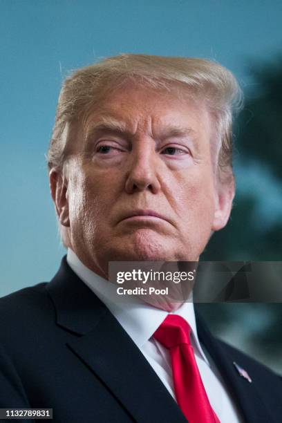 President Donald J. Trump listens to remarks from Prime Minister of Israel Benjamin Netanyahu , before signing an order recognizing Golan Heights as...