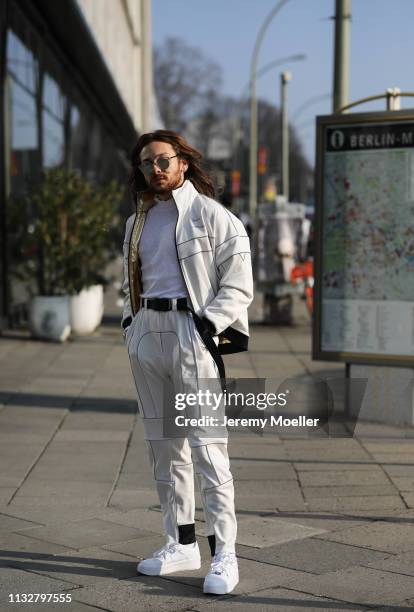 Riccardo Simonetti wearing a complete Nike x Ambush track suit and Cartier jewelry on February 28, 2019 in Berlin, Germany.