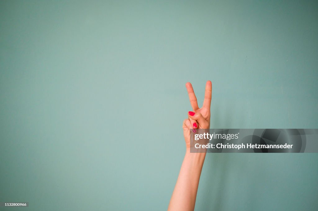 Finger peace sign