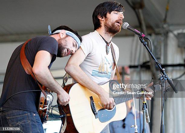 Seth Avett and Scott Avett of The Avett Brothers performs during day 1 of the 2011 New Orleans Jazz & Heritage Festival>> at the Fair Grounds Race...