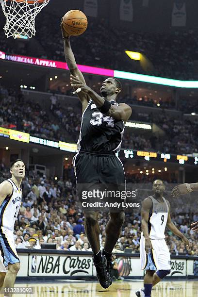 Antonio McDyess of the San Antonio Spurs shoots the ball against the Memphis Grizzlies in Game Six of the Western Conference Quarterfinals in the...
