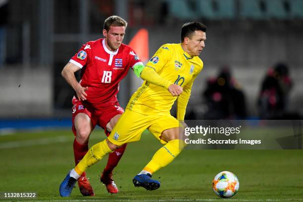 Laurent Jans of Luxembourg, Yevhen Konoplyanka of Ukraine during the EURO Qualifier match between Luxembourg v Ukraine at the Stade Josy Barthel on...