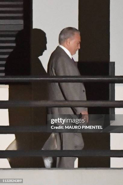 Brazil's former president Michel Temer, leaves the Federal Police headquarters in Rio de Janeiro, Brazil, on March 25 after a Brazilian judge ordered...