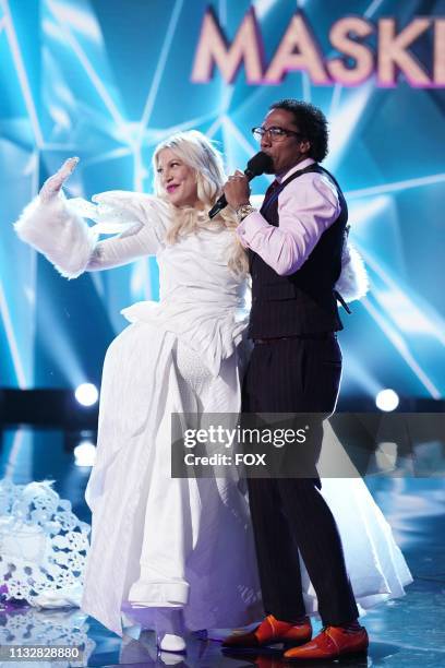 Tori Speiing and host Nick Cannon in the "Mix and Masks" episode of THE MASKED SINGER airing Wednesday, Jan. 30 on FOX.