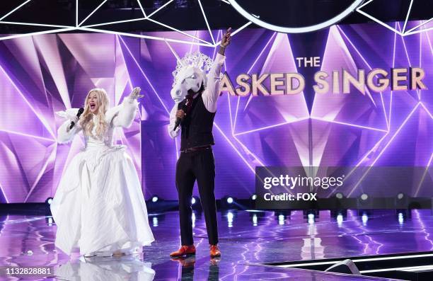 Tori Speiing and host Nick Cannon in the "Mix and Masks" episode of THE MASKED SINGER airing Wednesday, Jan. 30 on FOX.