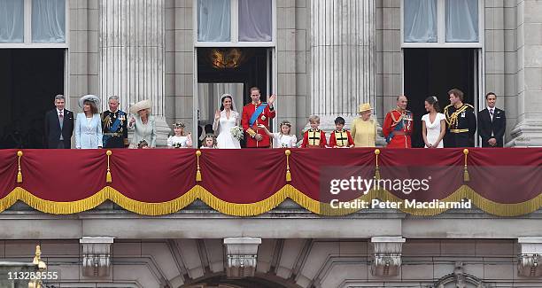 Prince William, Duke of Cambridge and Catherine, Duchess of Cambridge greet well-wishers from the balcony at Buckingham Palace on April 29, 2011 in...