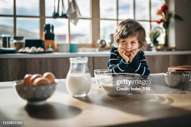 waiting for breakfast - kid waiting stock pictures, royalty-free photos & images