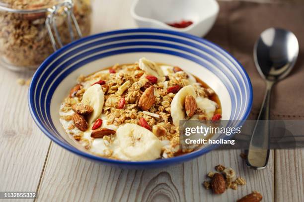 healthy granola yogurt bowl - wolfberry stock pictures, royalty-free photos & images