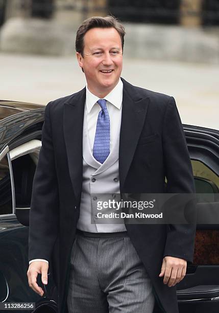 British Prime Minister David Cameron arrives to attend the Royal Wedding of Prince William to Catherine Middleton at Westminster Abbey on April 29,...