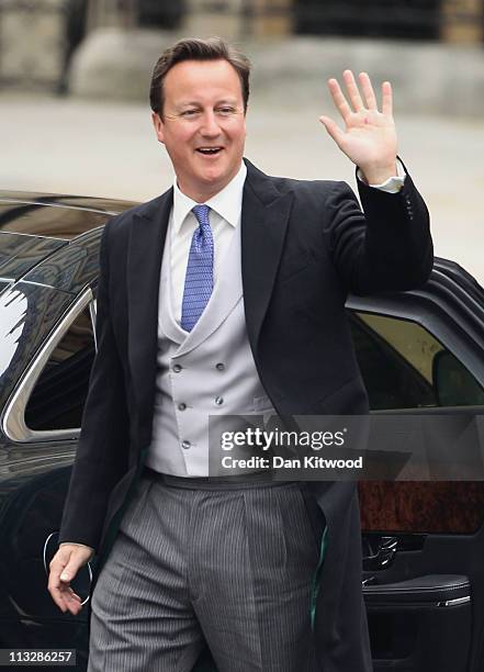 British Prime Minister David Cameron arrives to attend the Royal Wedding of Prince William to Catherine Middleton at Westminster Abbey on April 29,...