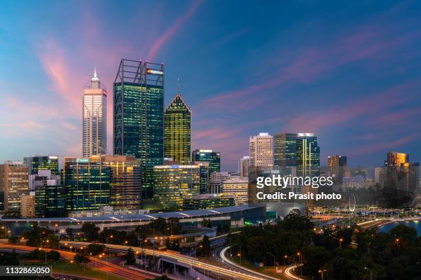 downtown perth city skyline at twilight in western australia, australia. - perth australia foto e immagini stock