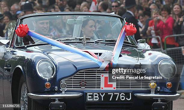 His Royal Highnesses Prince William Duke of Cambridge drives his wife HRH Catherine Duchess of Cambridge in a blue Aston Martin as they leave...