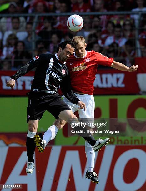 Bo Svensson of Mainz battles for the ball with Theofanis Gekas of Frankfurt during the Bundesliga match between FSV Mainz 05 and Eintracht Frankfurt...