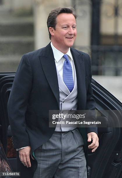 British Prime Minister David Cameron arrives to attend the Royal Wedding of Prince William to Catherine Middleton at Westminster Abbey on April 29,...