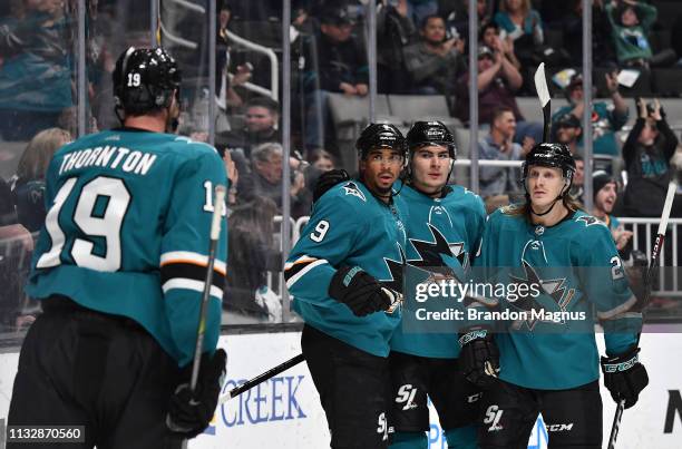 Evander Kane, Timo Meier, Joe Thornton and Marcus Sorensen of the San Jose Sharks celebrate after scoring against the Detroit Red Wings at SAP Center...