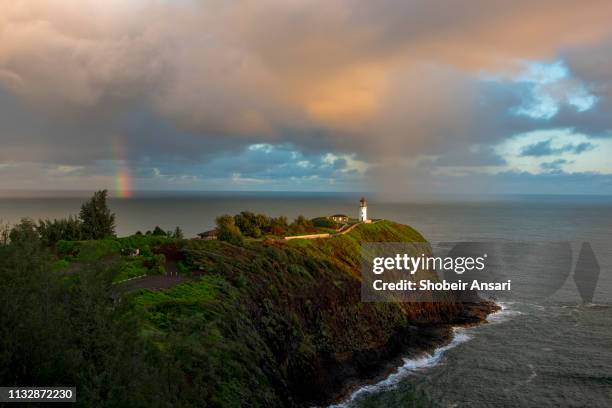 kilauea lighthouse and rainbow, kauai, hawaii - kilauea point national wildlife refuge stock pictures, royalty-free photos & images
