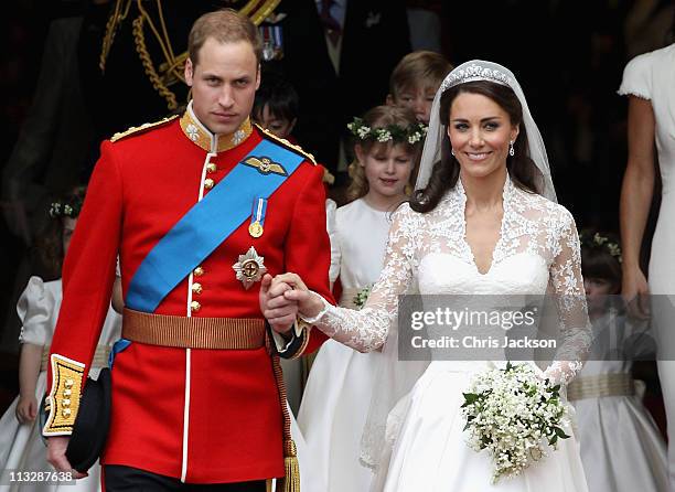 Prince William, Duke of Cambridge and Catherine, Duchess of Cambridge smile following their marriage at Westminster Abbey on April 29, 2011 in...