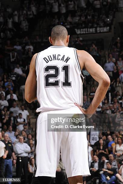 Tim Duncan of the San Antonio Spurs stands on the court during a game against the Memphis Grizzlies in Game Five of the Western Conference...