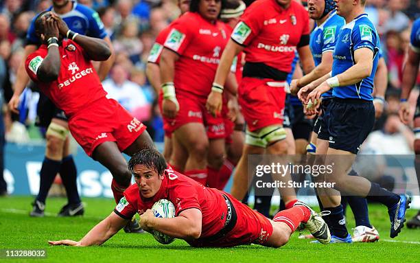 Toulouse number 8 Louis Picamoles breaks through to score a try during the Heineken Cup Semi Final between Leinster and Toulouse at Aviva Stadium on...