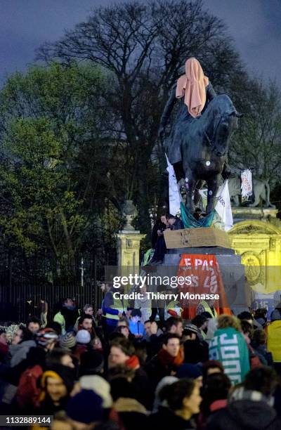 Climate activists form a protest camp near the statue of King Leopold II at Trone square on March 25, 2019 in Brussels, Belgium. The activists want...