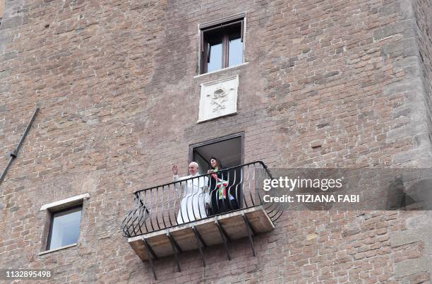 Rome mayor Virginia Raggi shows Pope Francis the view over the Roman Forum from a balcony during the Pope's visit to Rome's City Hall on Capitoline...