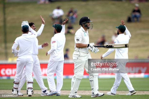 Ross Taylor of New Zealand walks off the field after being dismissed LBW by Soumya Sarkar of Bangladesh during day two of the First Test match in the...