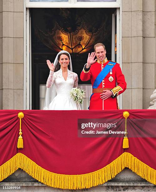 Prince William, Duke of Cambridge and Catherine, Duchess of Cambridge greet crowd of admirers from the balcony of Buckingham Palace on April 29, 2011...