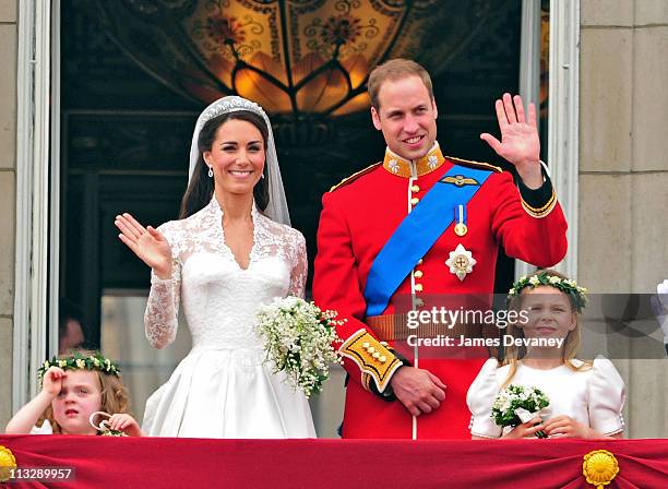 Prince William, Duke of Cambridge and Catherine, Duchess of Cambridge greet crowd of admirers from the balcony of Buckingham Palace on April 29, 2011...