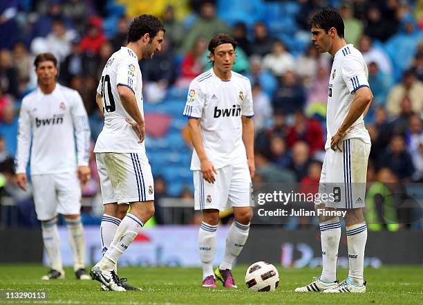 Kaka and Higuain of Real Madrid look on after conceeding another goal during the La Liga match between Real Madrid and Real Zaragoza at Estadio...