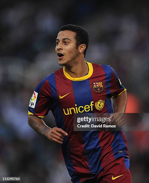 Thiago of FC Barcelona celebrates after scoring during the La Liga match between Real Sociedad and Barcelona at Estadio Anoeta on April 30, 2011 in...