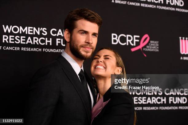 Liam Hemsworth and Miley Cyrus attends The Women's Cancer Research Fund's An Unforgettable Evening Benefit Gala at the Beverly Wilshire Four Seasons...