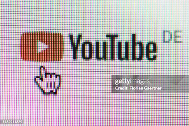 In this photo illustration the mouse cursor is pictured on the YouTube logo on March 26, 2019 in Berlin, Germany.