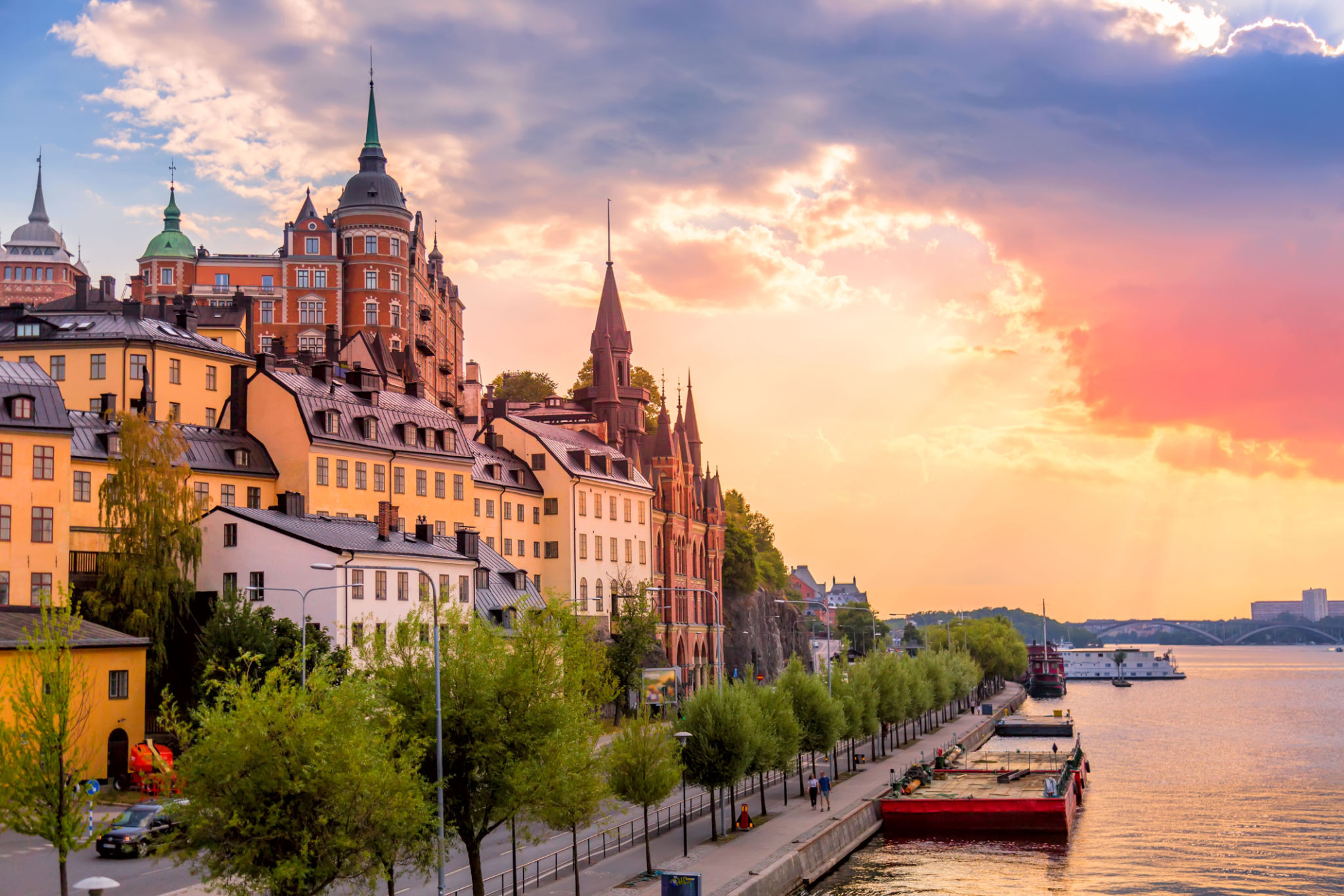 Stockholm, Sweden. Scenic summer sunset view with colorful sky of the Old Town architecture in Sodermalm district. Stockholm, Sweden. Scenic summer sunset view with colorful sky of the Old Town architecture in Sodermalm district.