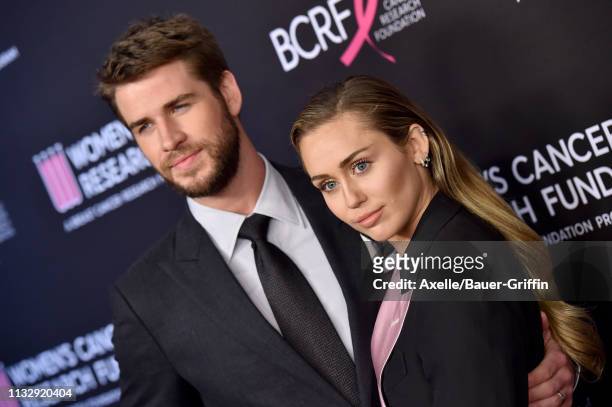 Liam Hemsworth and Miley Cyrus attend The Women's Cancer Research Fund's An Unforgettable Evening Benefit Gala at the Beverly Wilshire Four Seasons...