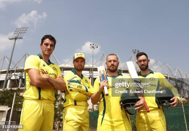 Pat Cummins, Carey, Aaron Finch and Glenn Maxwell of Australia pose ahead of game one of the One Day International series between India and Australia...