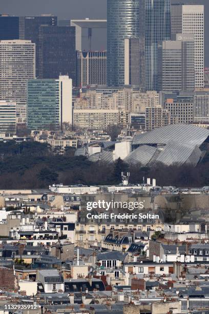 Aerial view of Paris and La Défense area, a major business district of the Paris Metropolitan Area and of the Île-de-France region on the banks of...