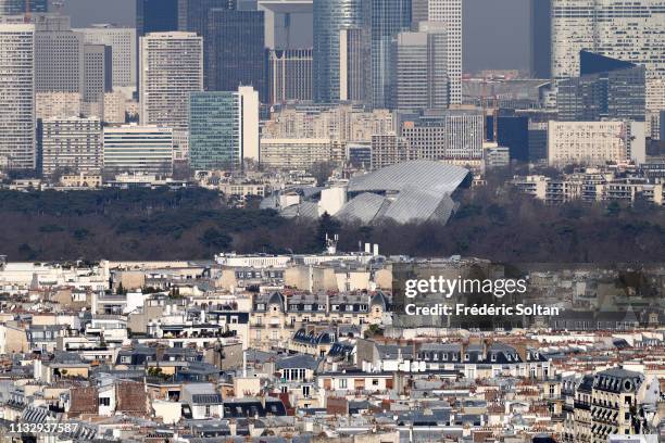 Aerial view of Paris and La Défense area, a major business district of the Paris Metropolitan Area and of the Île-de-France region on the banks of...