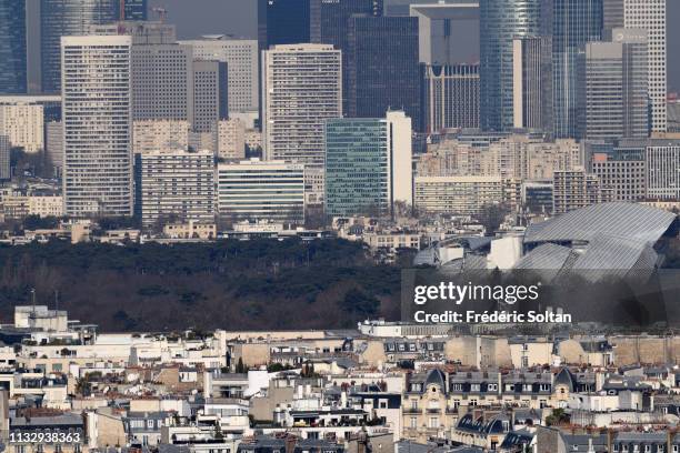 Aerial view of Paris and La Défense area, a major business district of the Paris Metropolitan Area and of the Île-de-France region on the banks of...