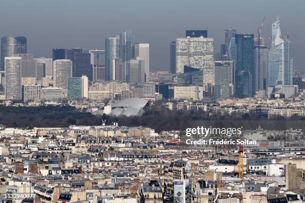 Aerial view of Paris and La Défense area, a major business district of the Paris Metropolitan Area and of the Île-de-France region on the banks of...