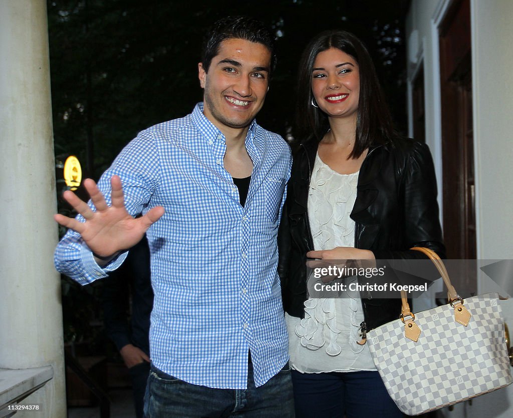 Nuri Sahin and his wife Tugba Sahin celebrate winning the German
