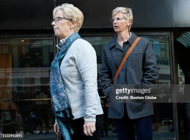 Donna Heinel, right, of California, who was senior associate athletic director at the University of Southern California, departs the John Joseph...