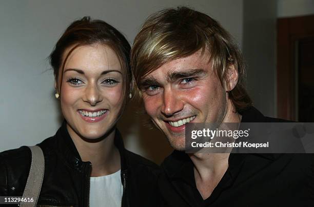 Girl-friend Anika and Marcel Schmelzer pose before celebrate winning the German Championships at a restaurant on April 30, 2011 in Dortmund, Germany.