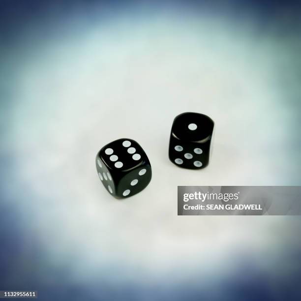 throw a seven - dice rolling stock pictures, royalty-free photos & images